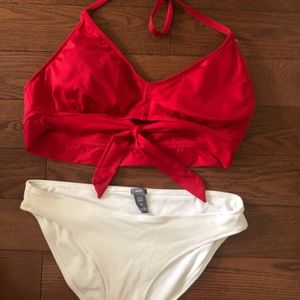 Large red bathing suit top and medium white bottom